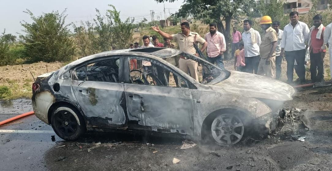 Moving car catches fire in Vijaypur
