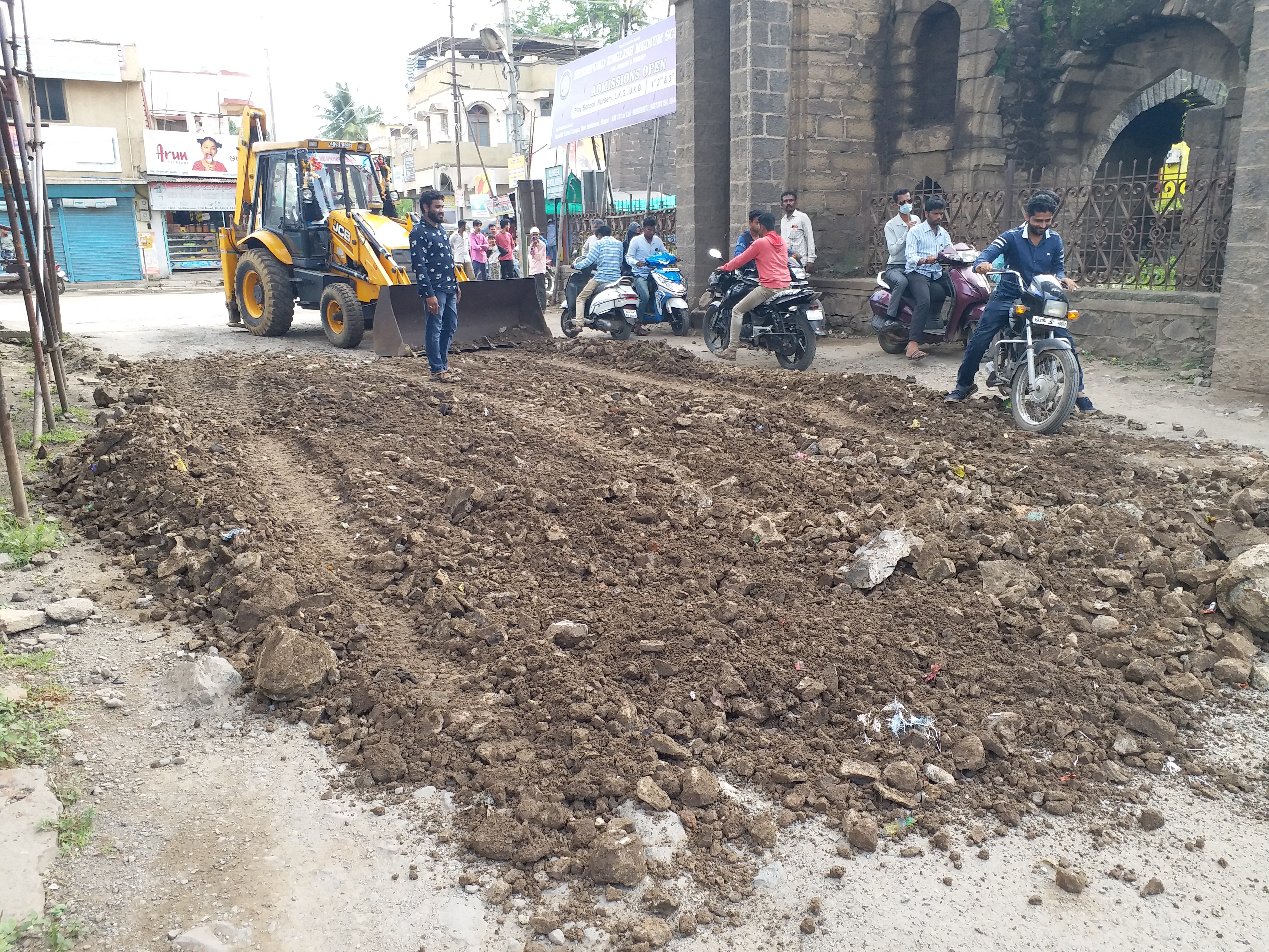 youth repair road in vijayapura