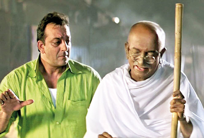 Sanjay Dutt with Dilip Prabhavalkar in a still from Lage Raho Munna Bhai