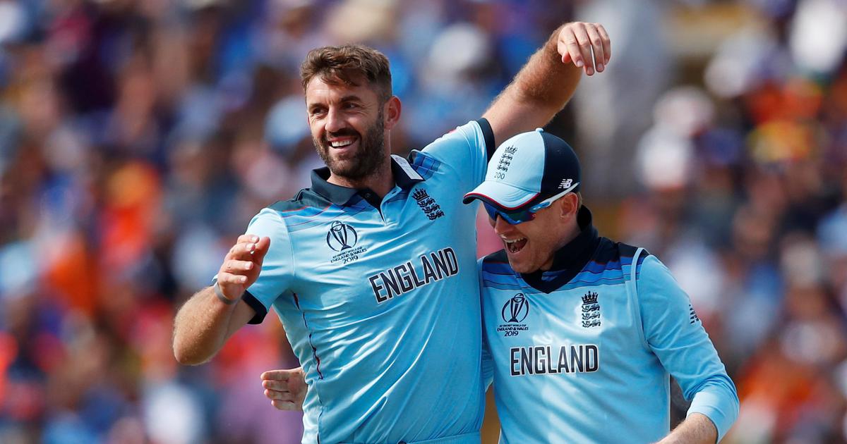 Liam Plunkett with England captain Eoin Morgan