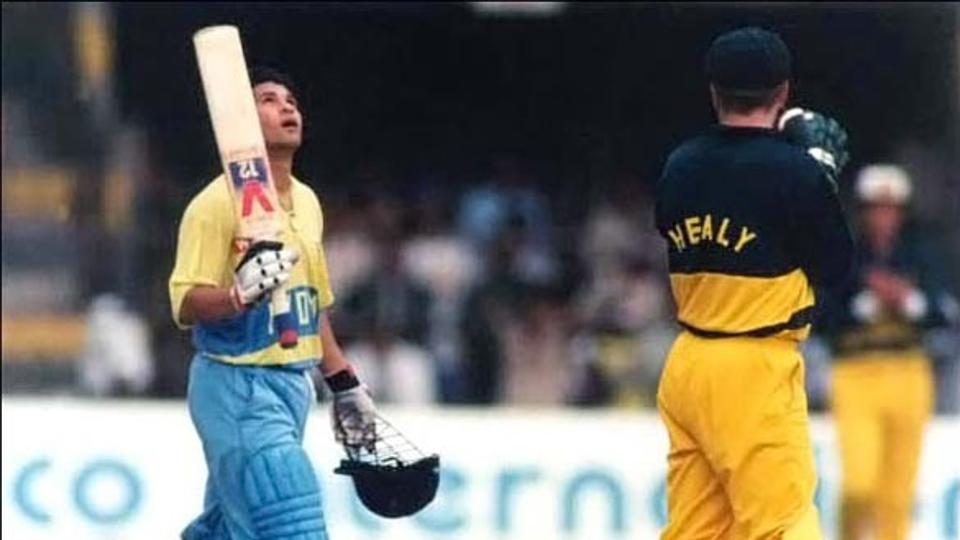 Tendulkar celebrates after scoring his maiden ODI ton