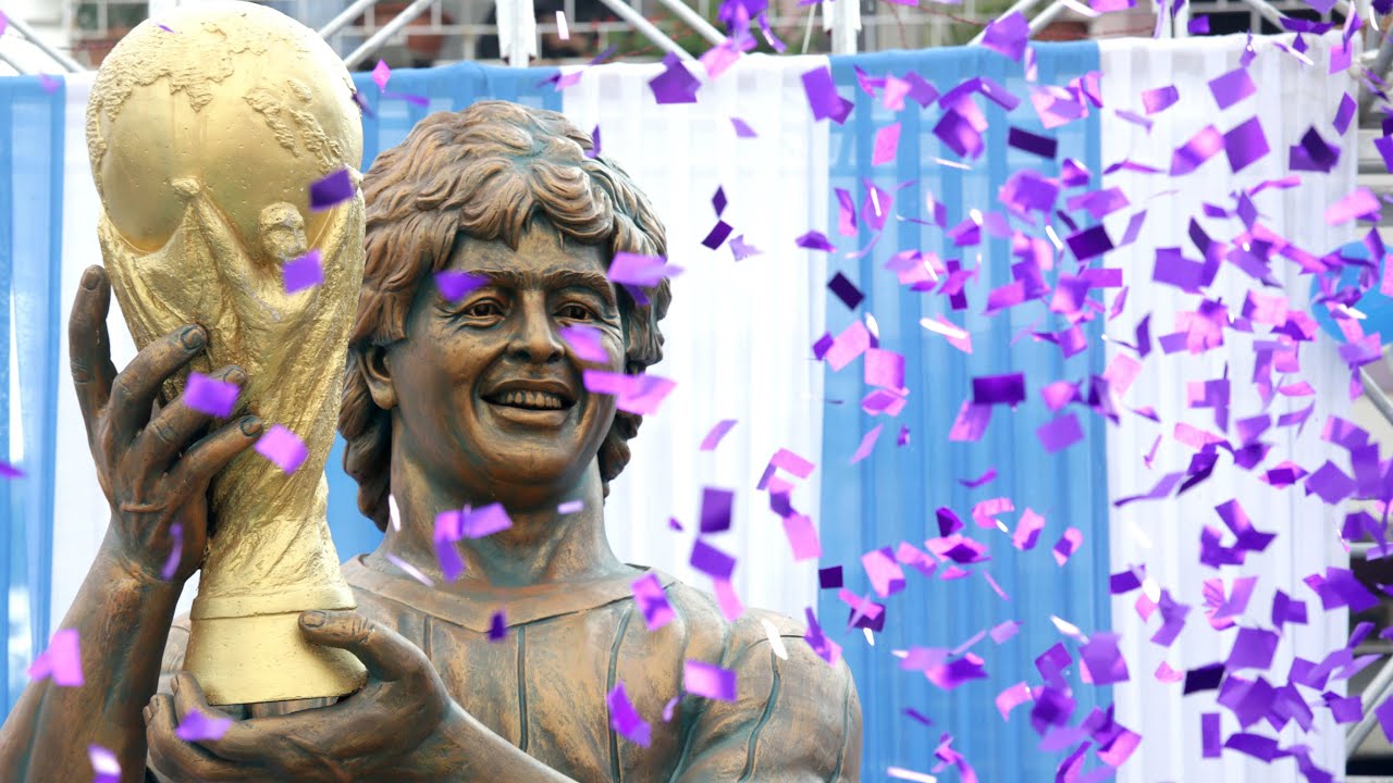 Maradona's statue with the 1986 World Cup trophy.