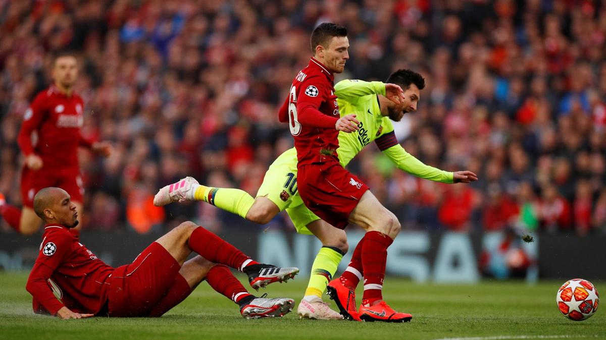 Messi fails to surpass the challenge posed by Liverpool defenders.