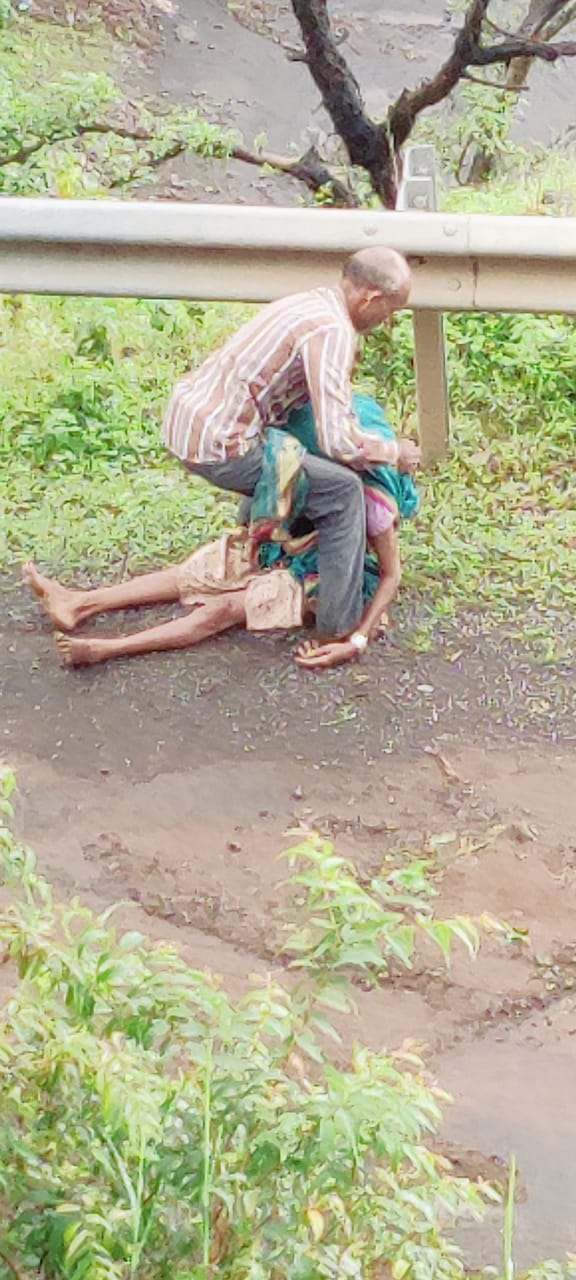 Elderly man carry his wife on shoulder