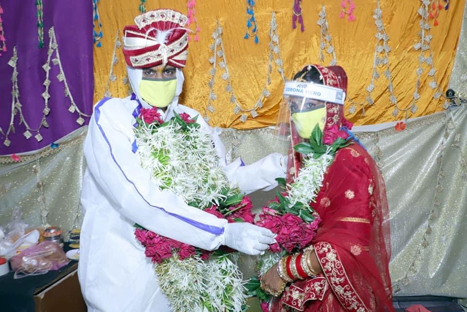 The bride too was seen wearing a face-mask