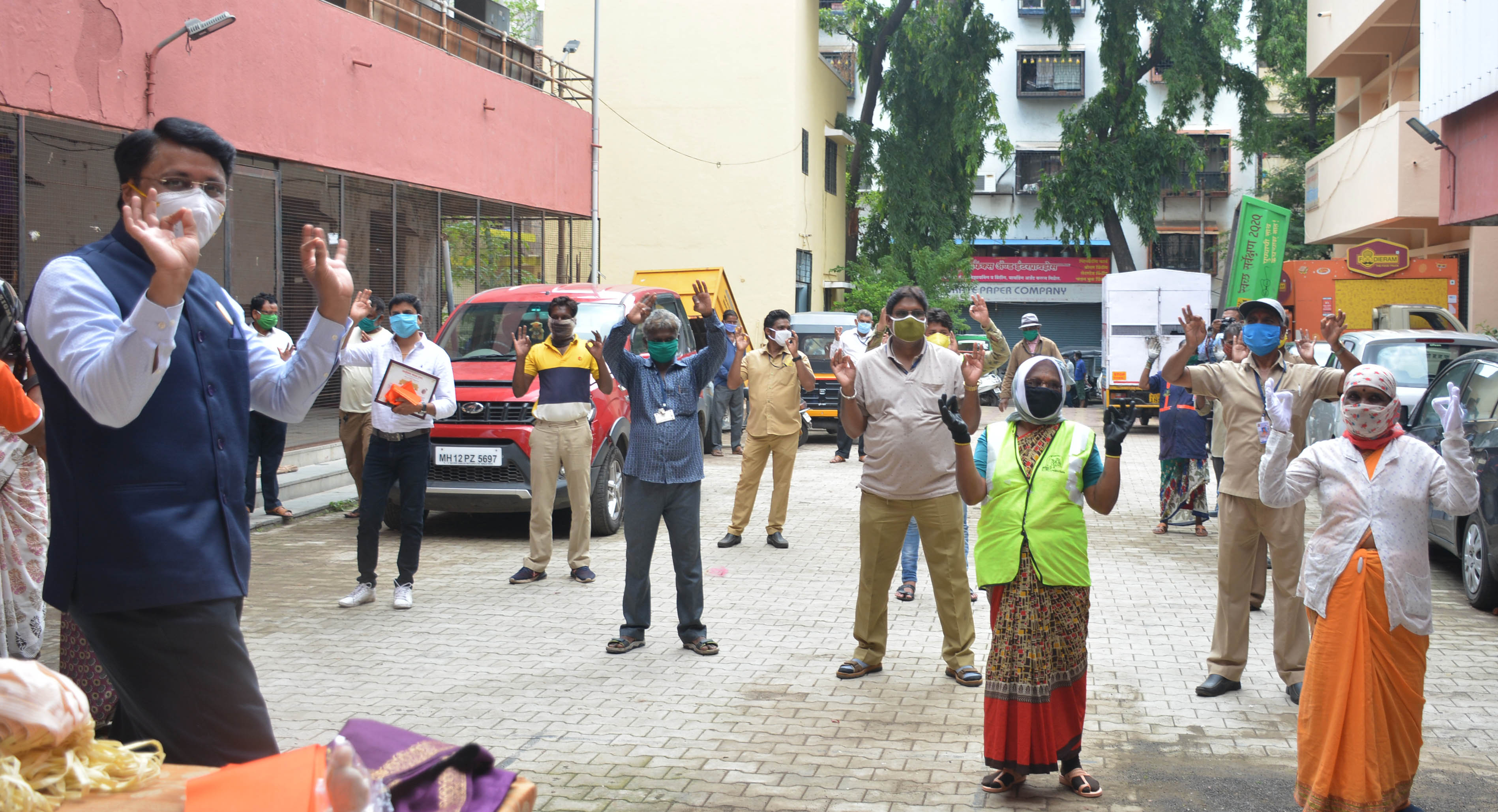 The cleaning staff honored by sainath mandal trust budhvar peth pune