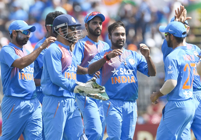 Amit Mishra took one wicket giving away 23 runs against England in his last match in India jersey.