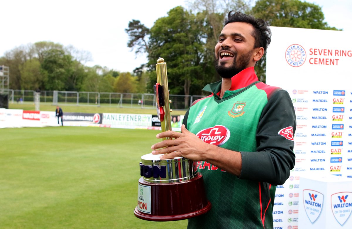 Captain Mashrafe Mortaza lifts the trophy after winning tri-series in Ireland.