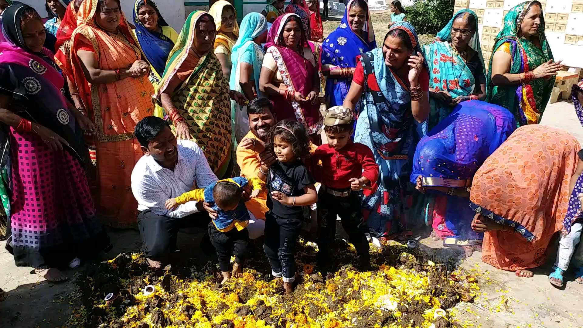 Tradition of putting young children on cow dung in betul