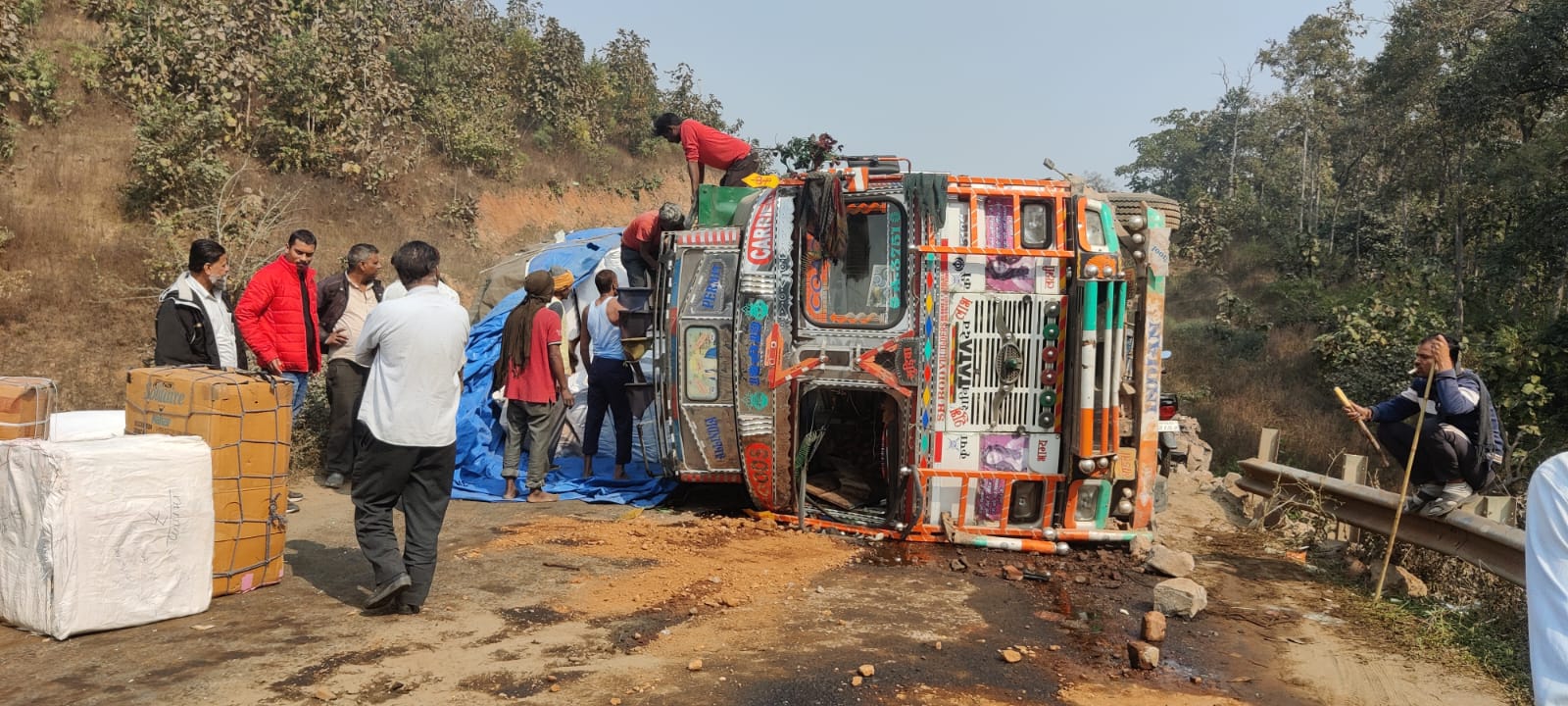 overturning truck in betul