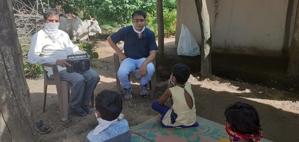 Teachers give radio to children