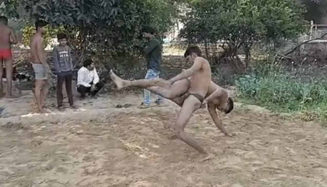 bhind youth learning the tricks of wrestling