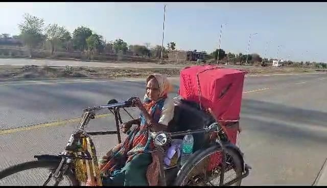 90 year old mother on tricycle