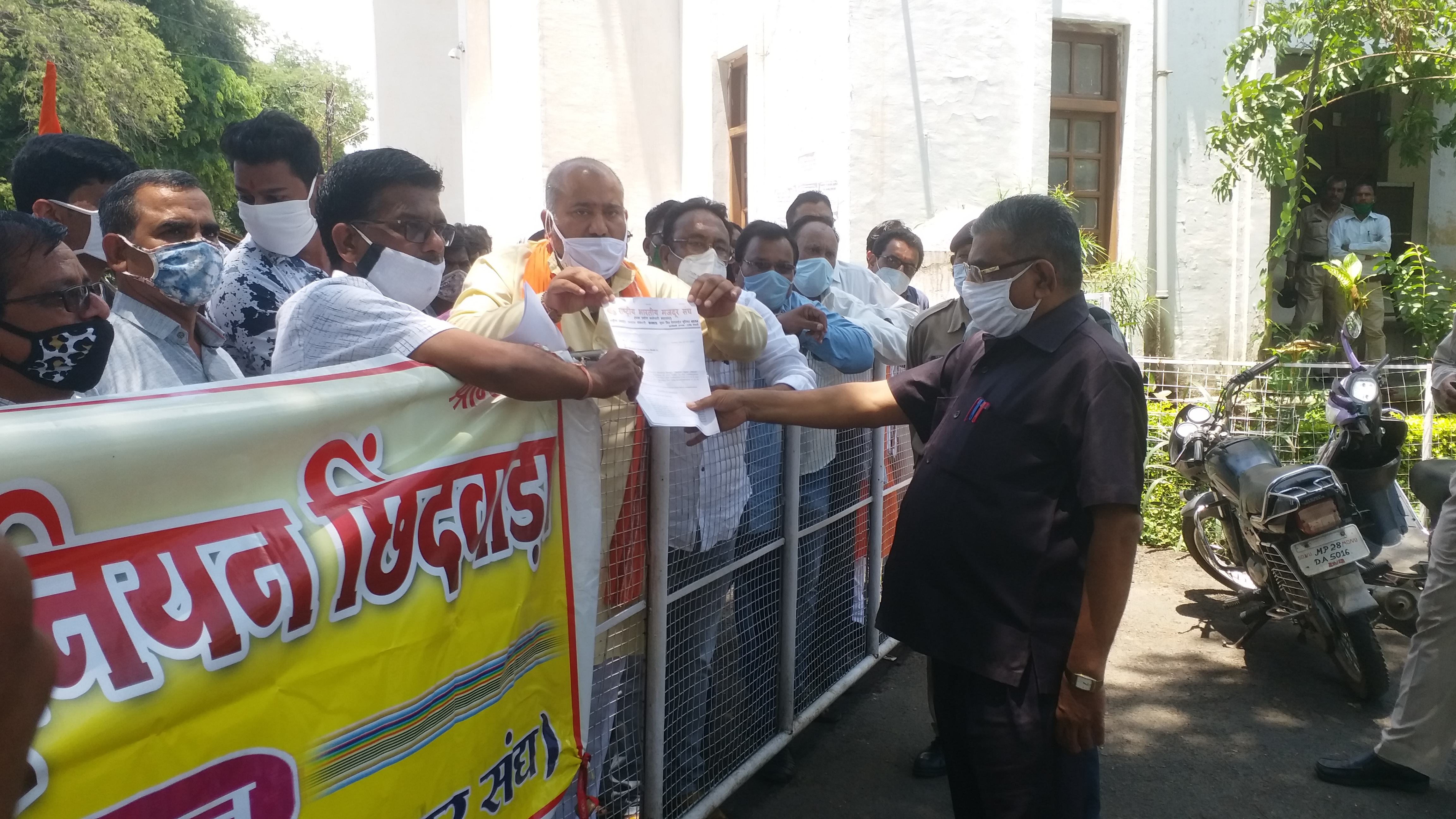 Workers handing out memorandum