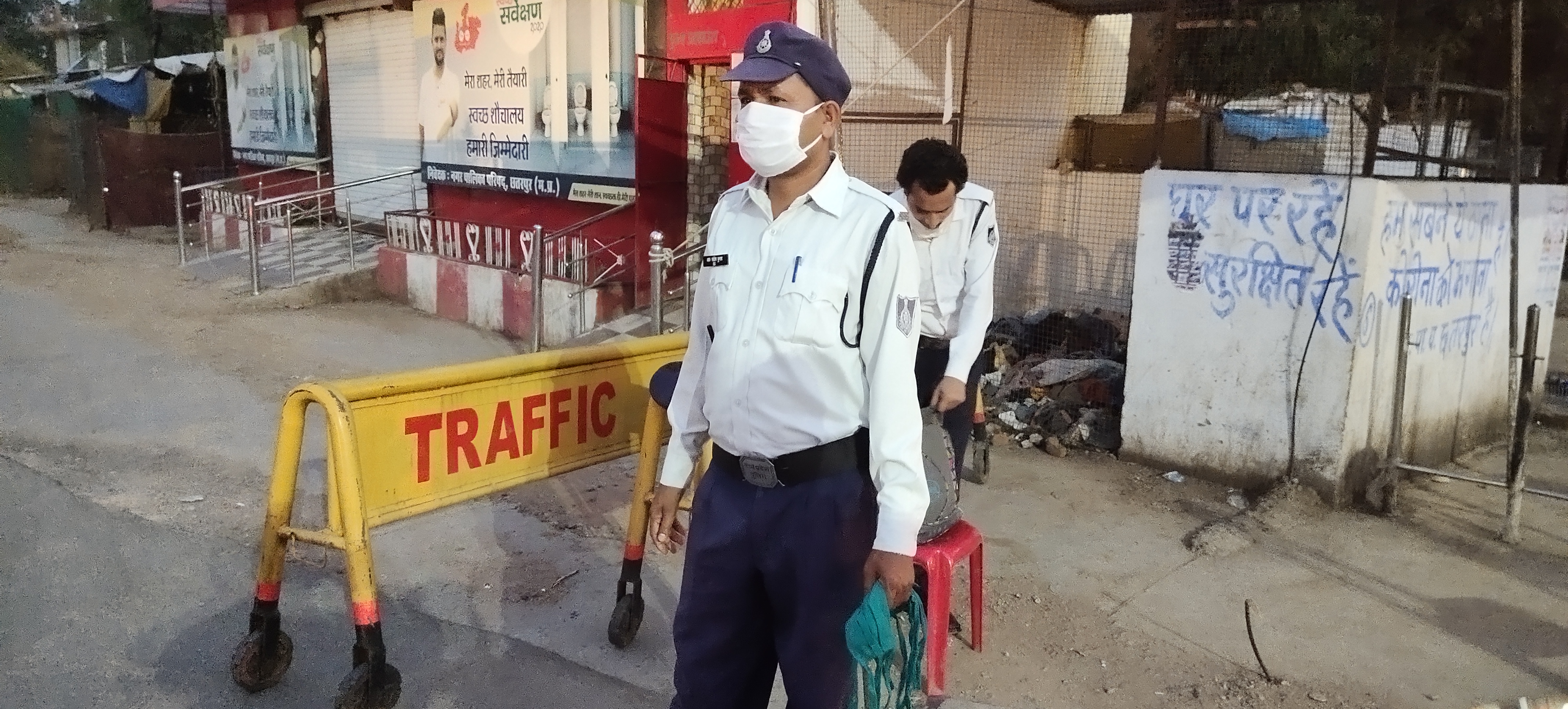 Police appealing people to apply masks with folded hands