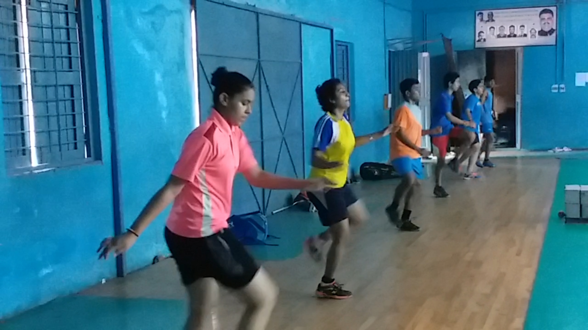 badminton players practicing