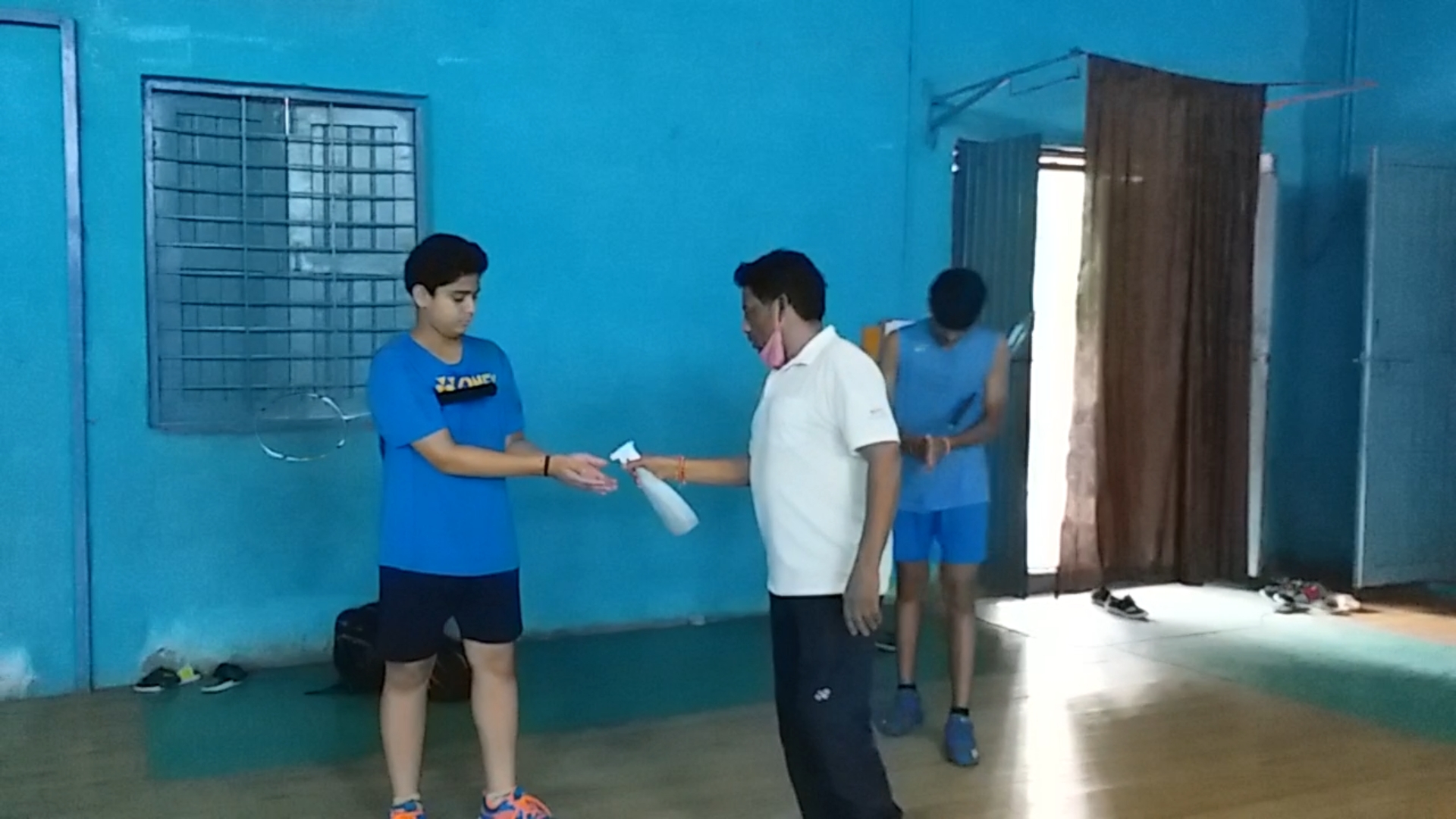 badminton players practicing