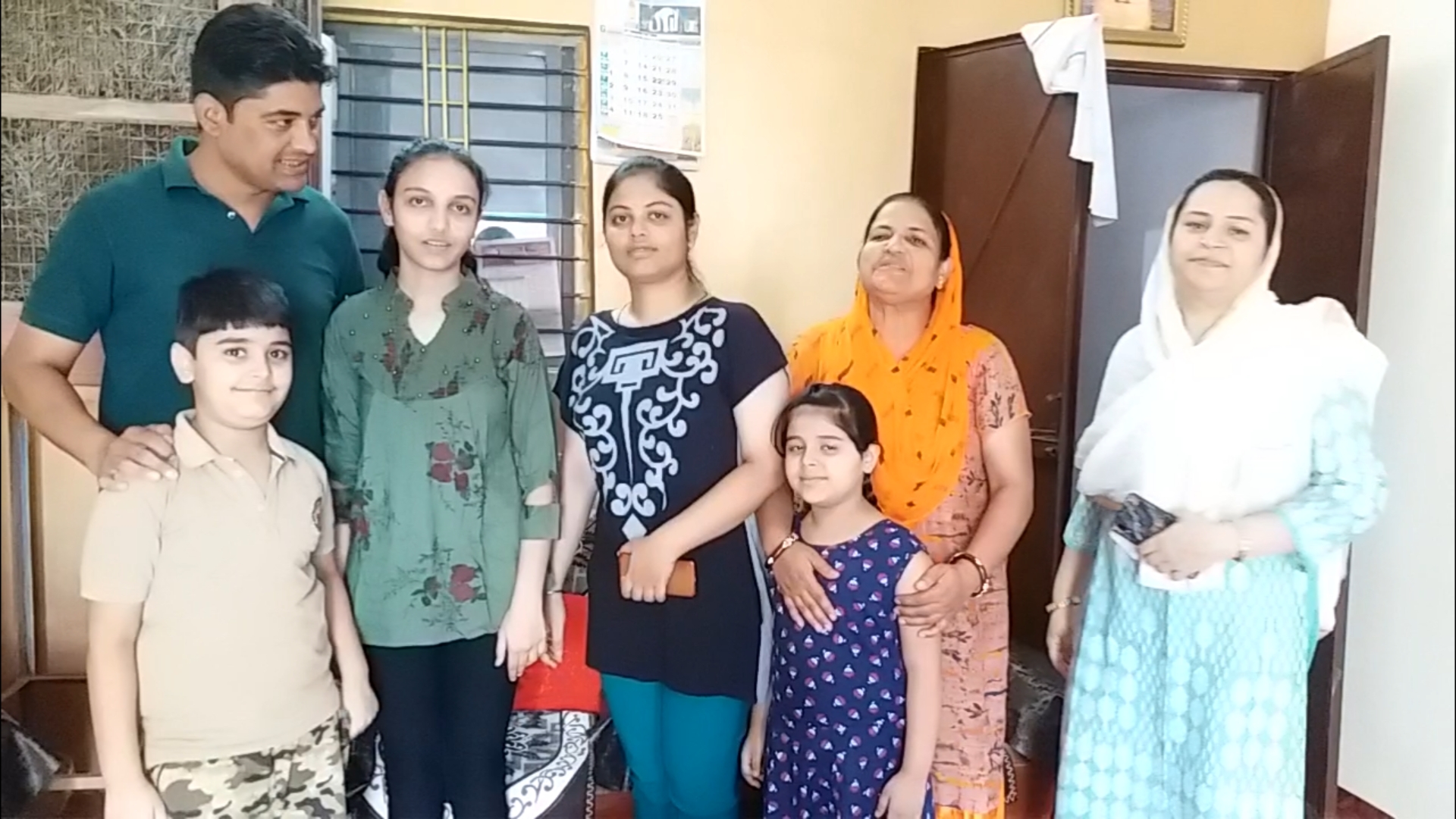 Schoolgirl Shameen Khan with her family