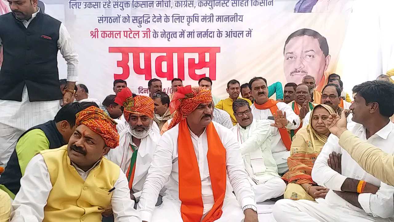 Agriculture Minister Kamal Patel sitting on fast