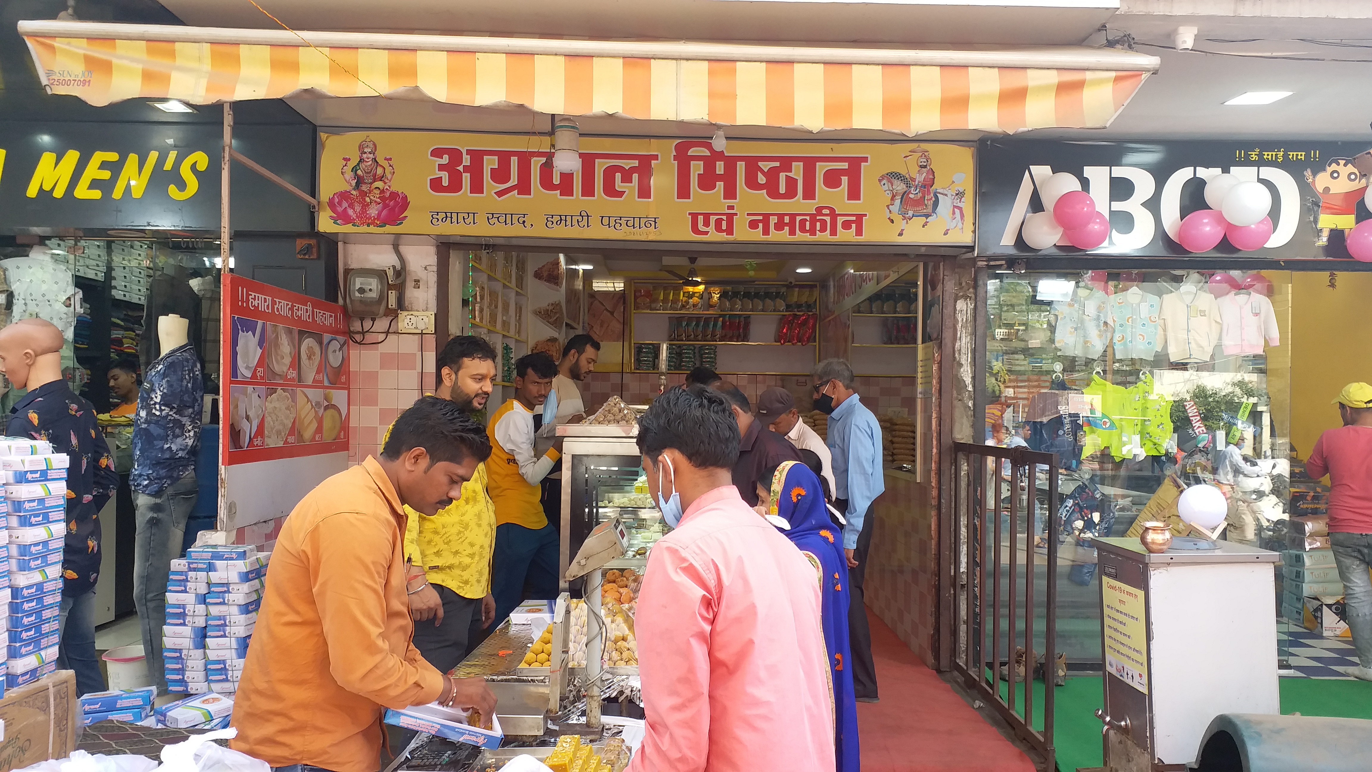 Customers at the sweet shop