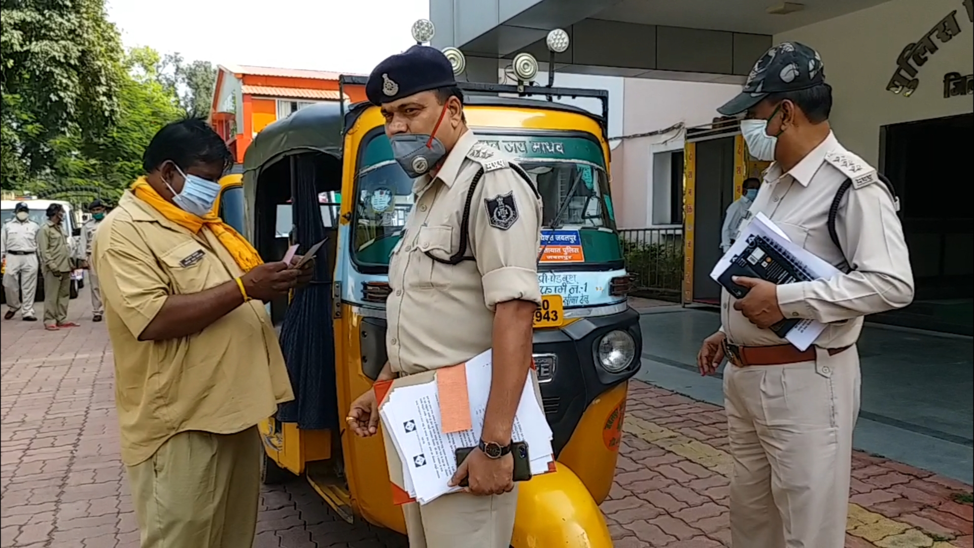 Police with auto driver