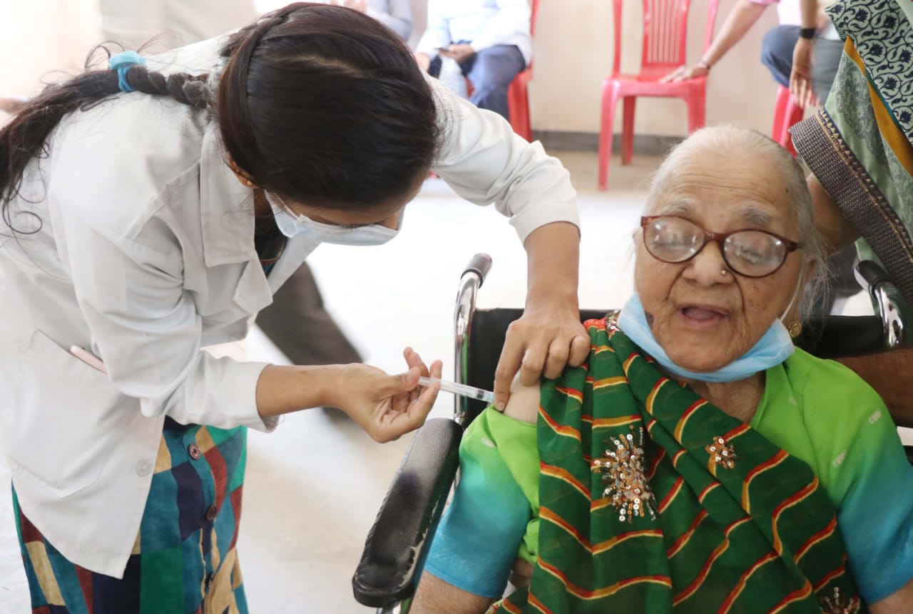 Elderly woman gets vaccinated in Khargone