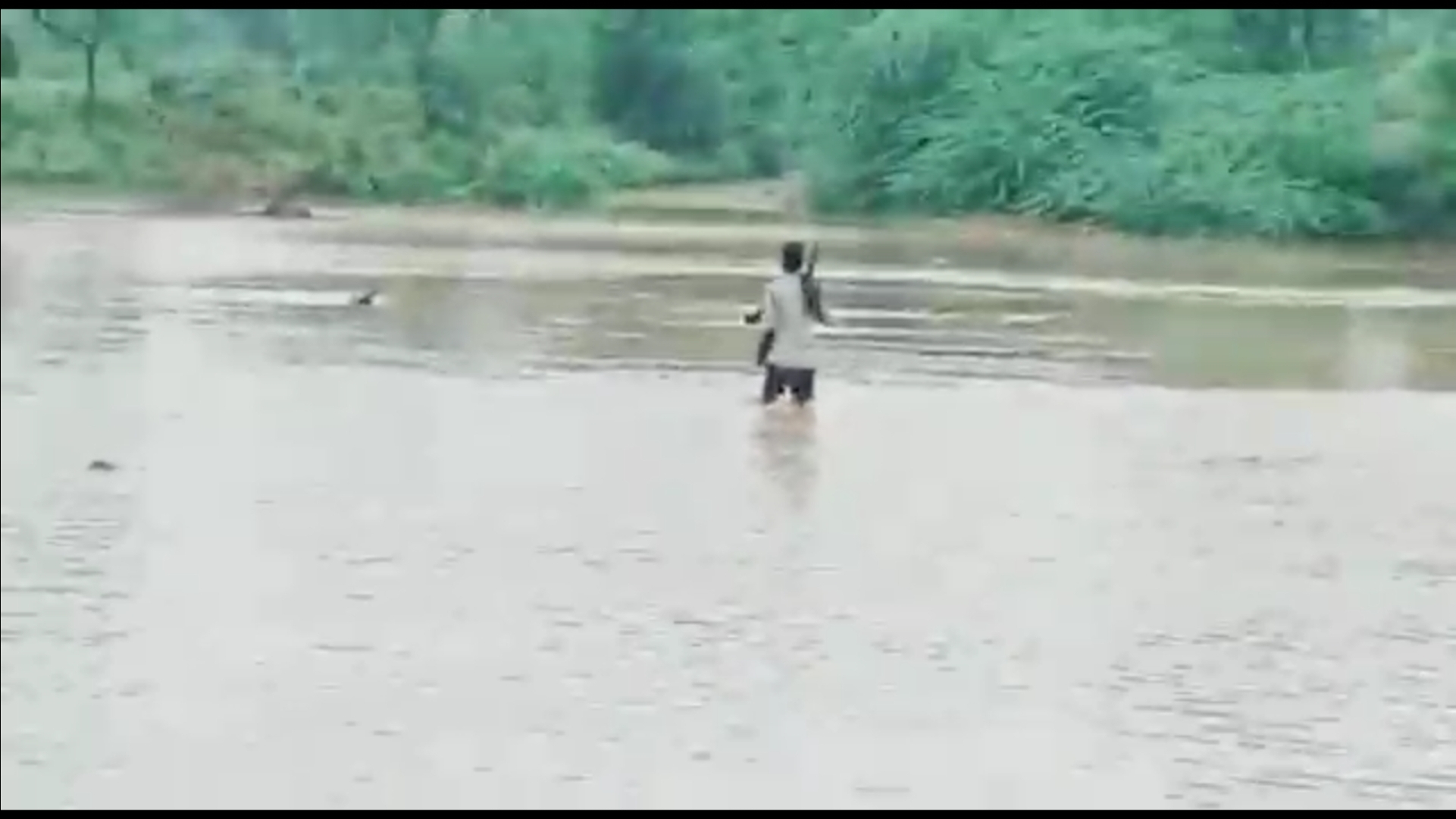 People crossing the river risking their lives