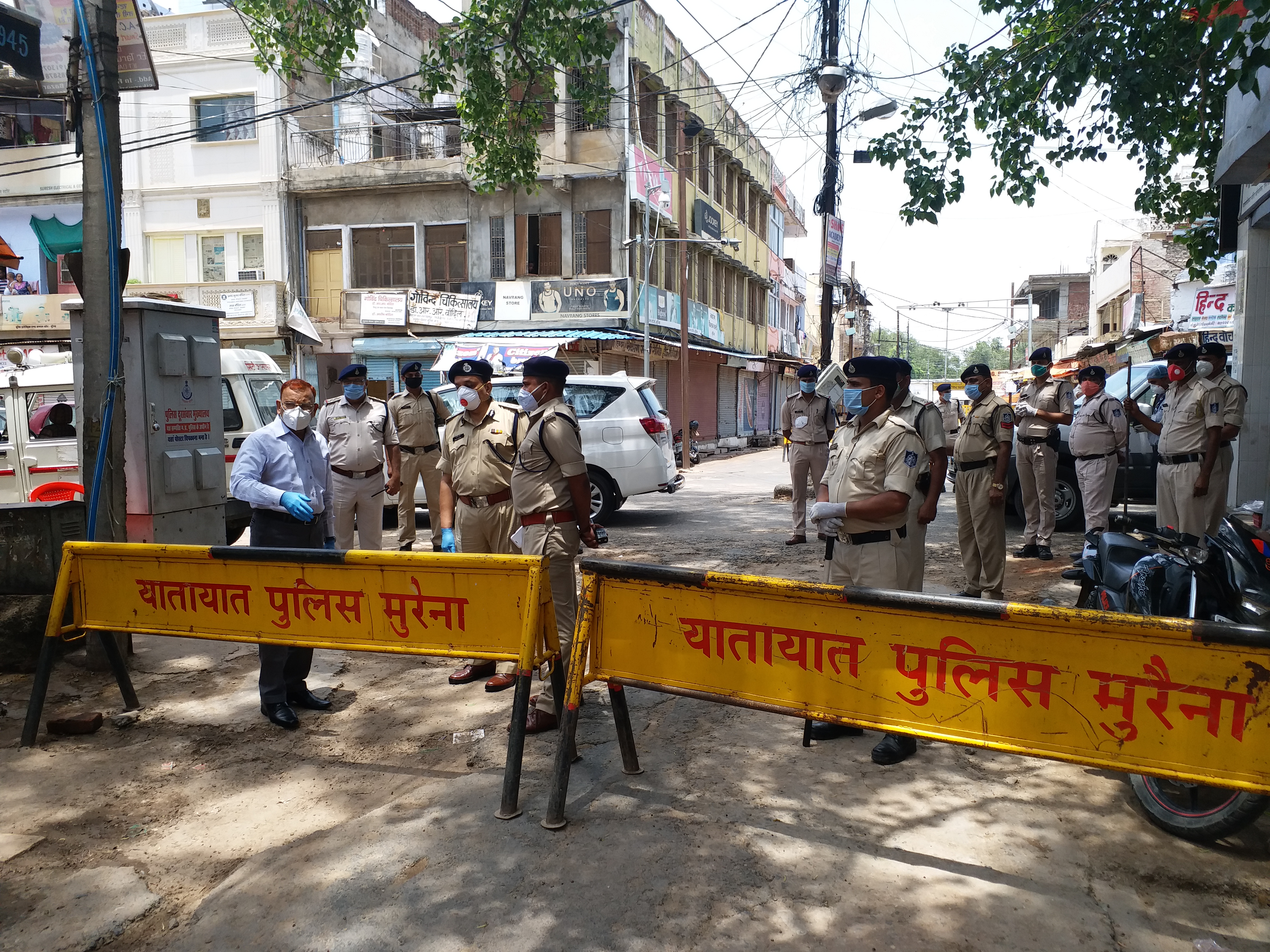 Police standing with barrier