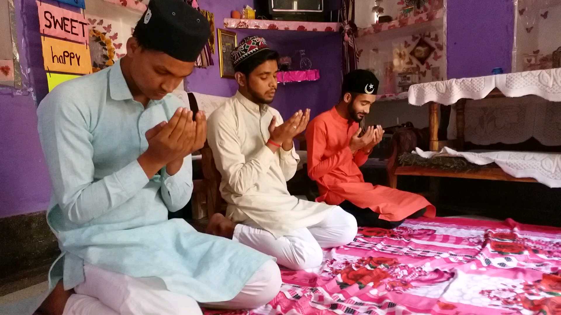 Youth praying on Eid