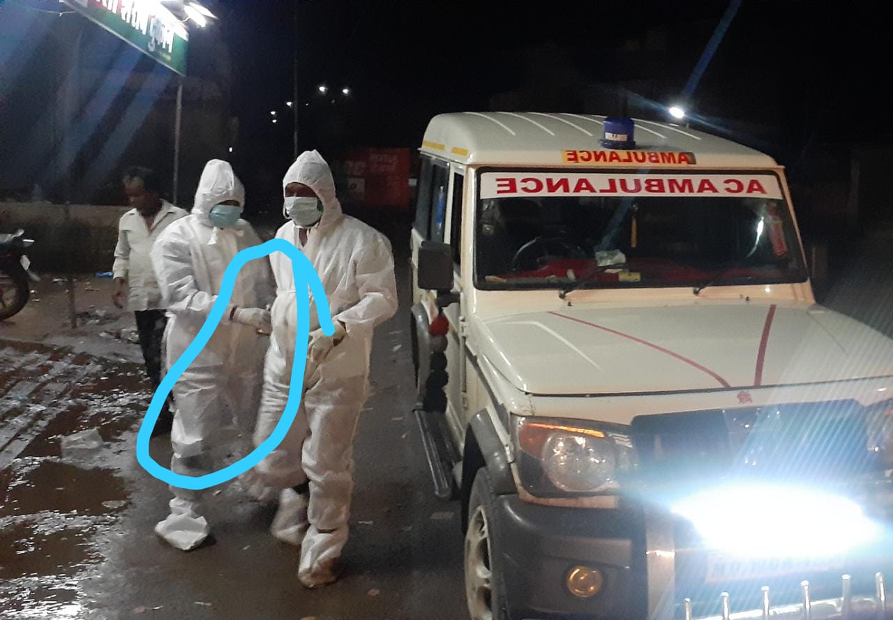 Health workers with alcohol in PPE kit