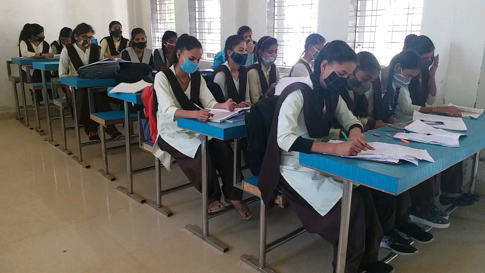 Children studying in converted school