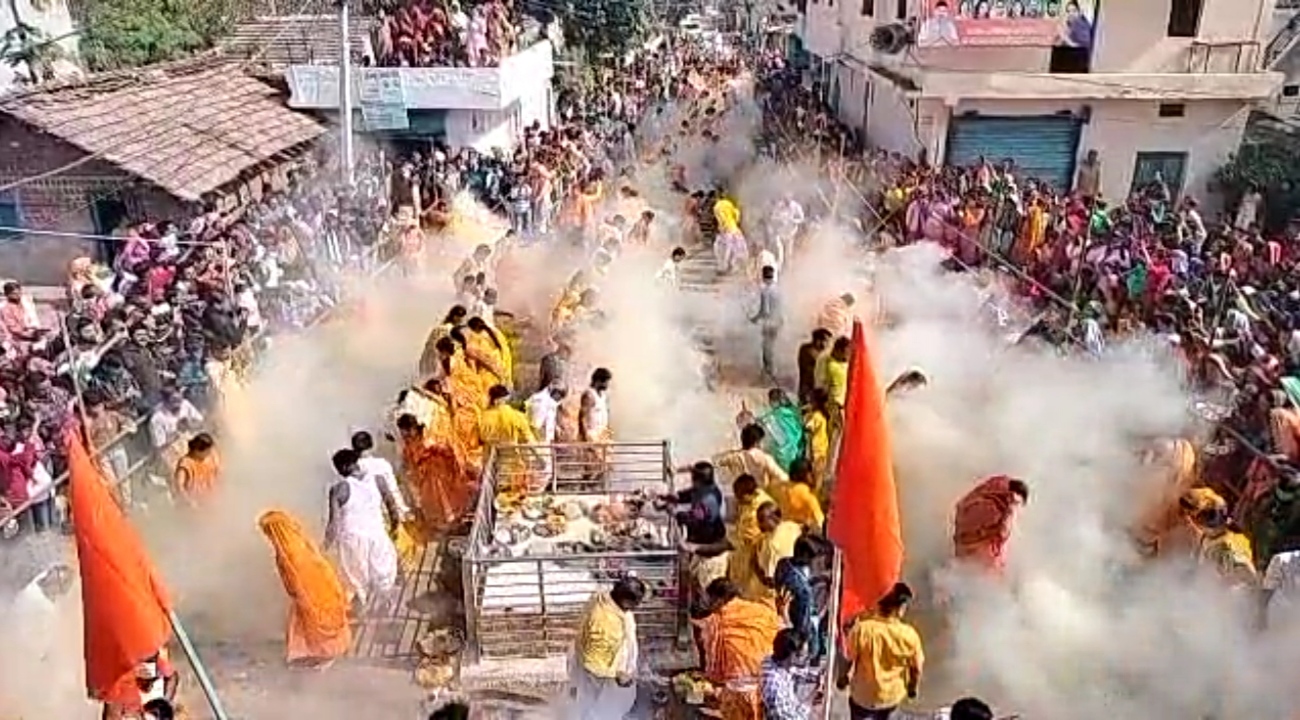 sagar devotees walk on burn coals