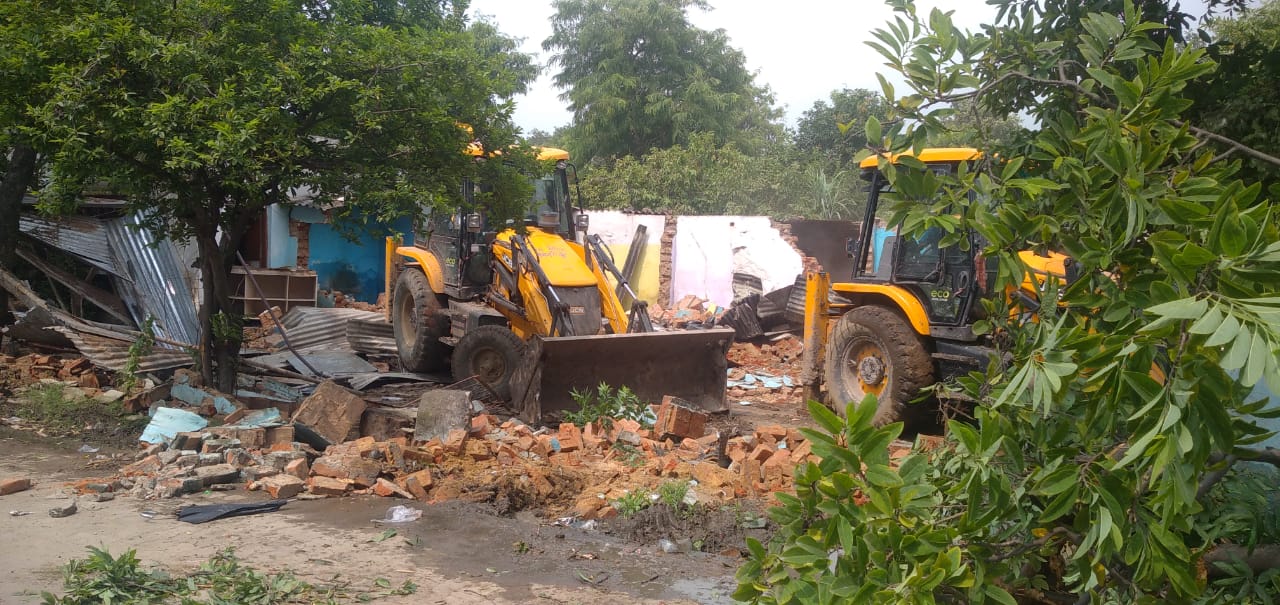 Bulldozer run encroachment Singrauli