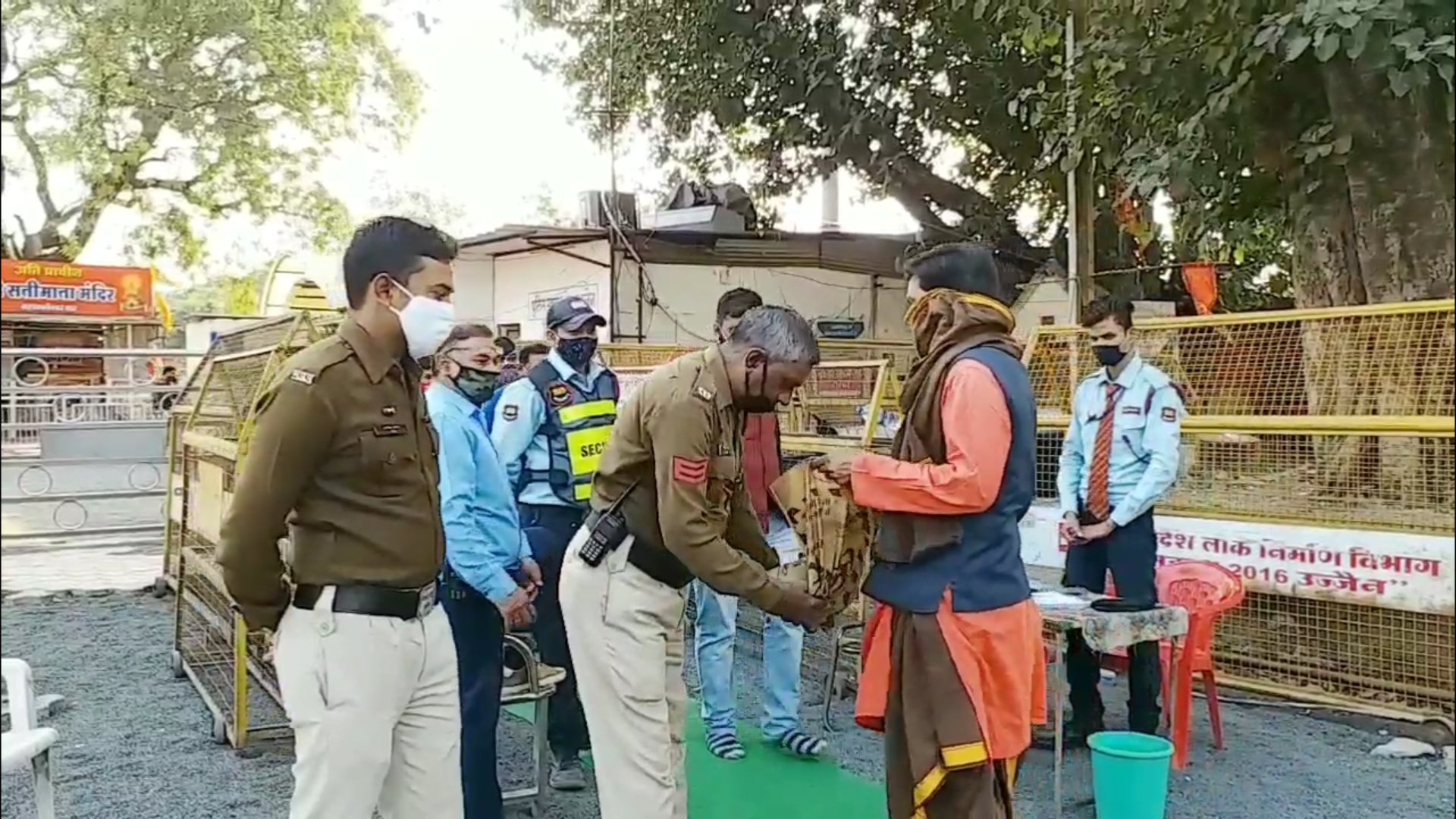 Policemen checking in the temple premises