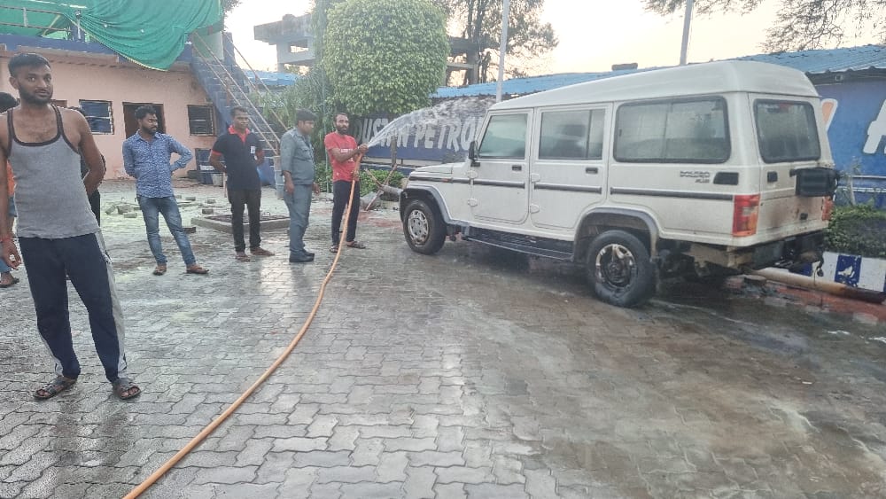 Fire in car parked at petrol pump