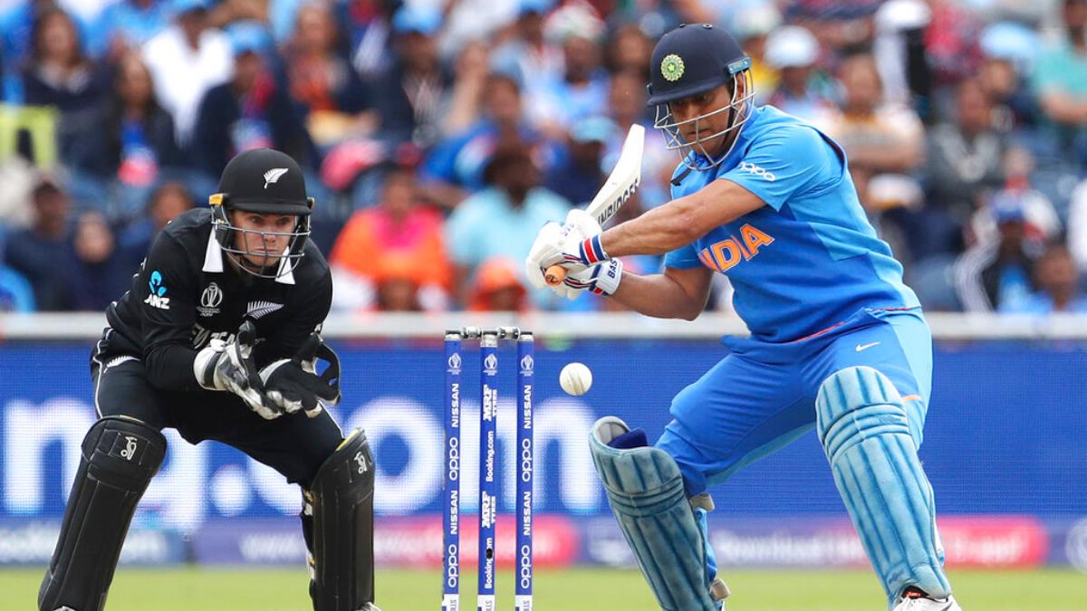 MS Dhoni plays a shot in the first semifinal of 2019 World Cup at Old Trafford against New Zealand.