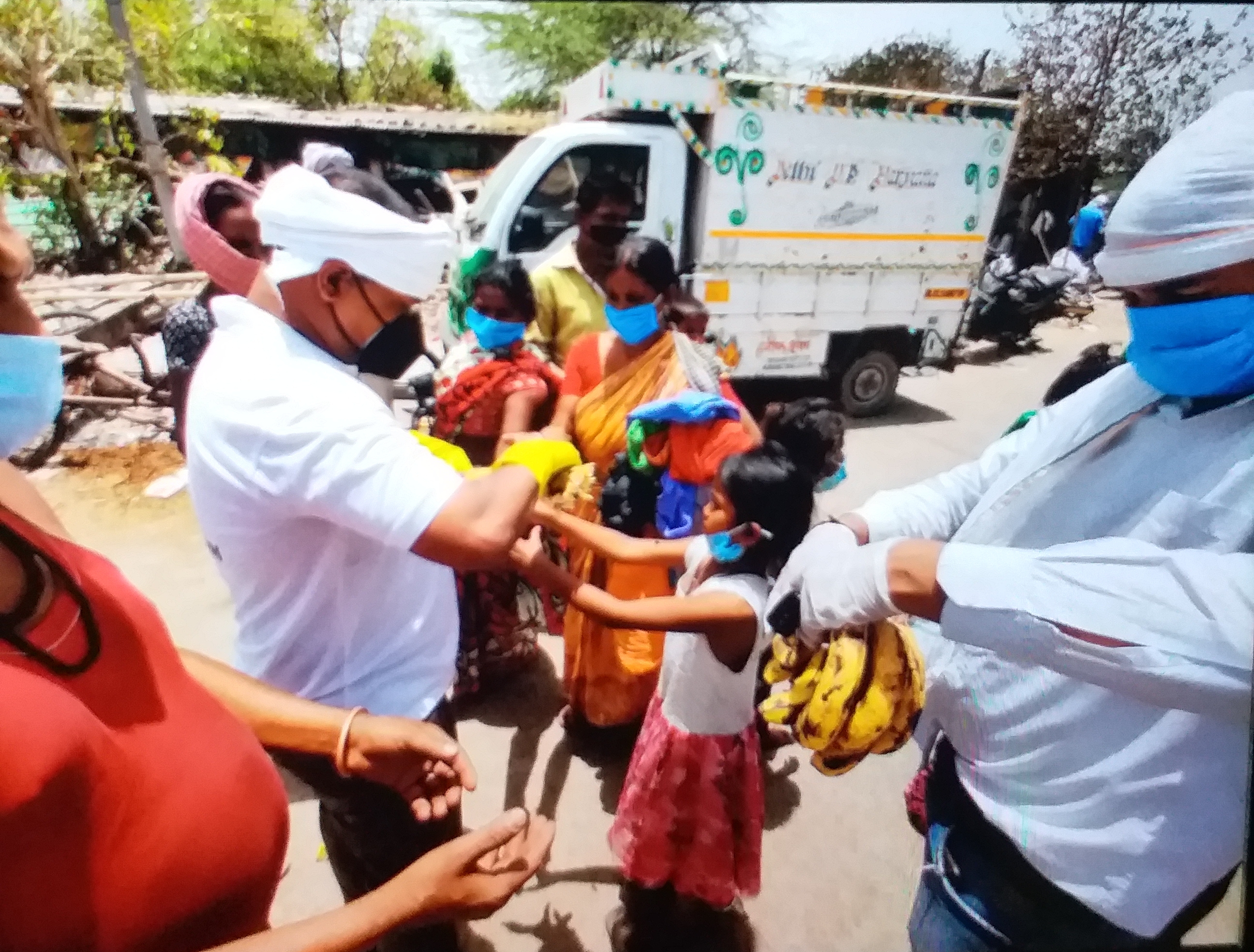 Youth Congress workers provide relief materials to Tughlakabad slum fire victims