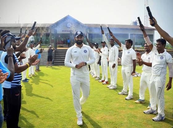 Abhishek Nayar is being given the guard of honour by Puducherry cricketers.