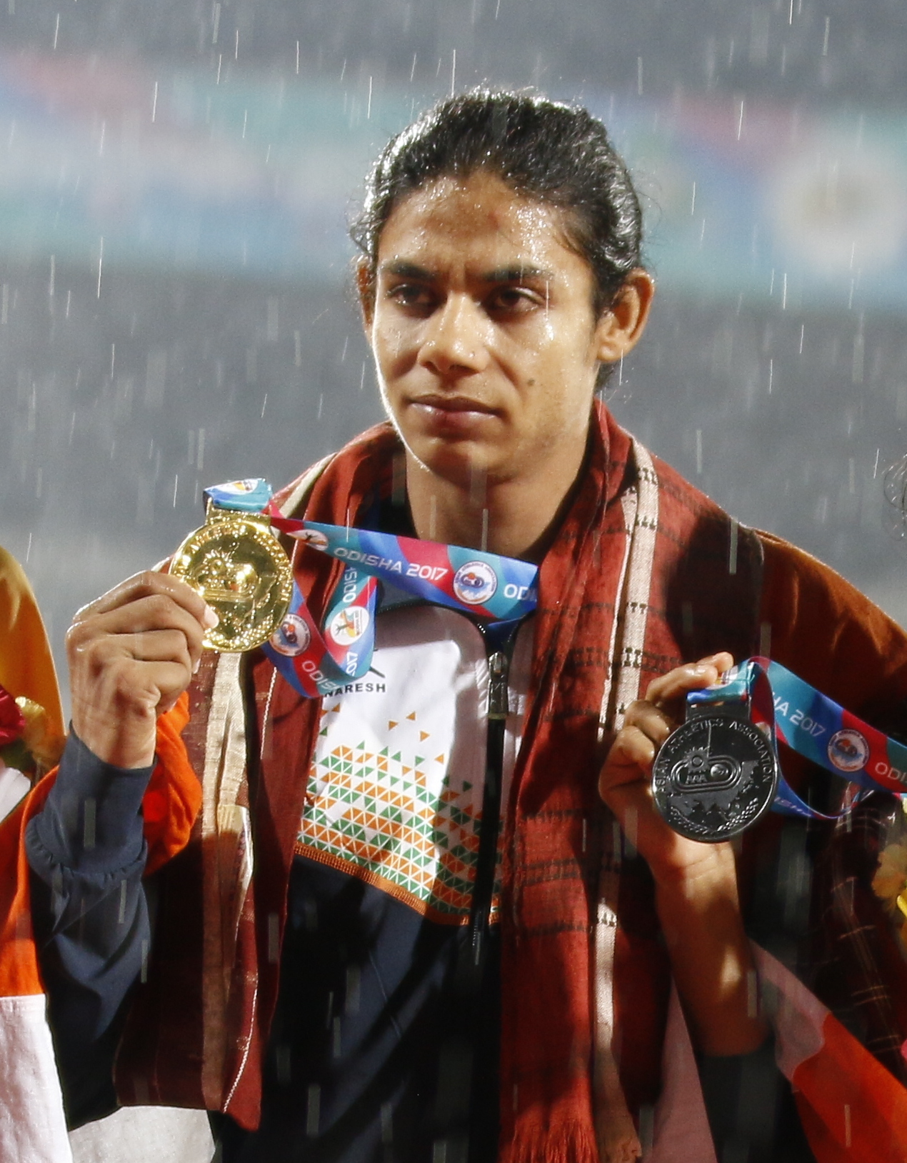 Nirmala Sheoran flaunts her medals at the 2017 Asia Championships.