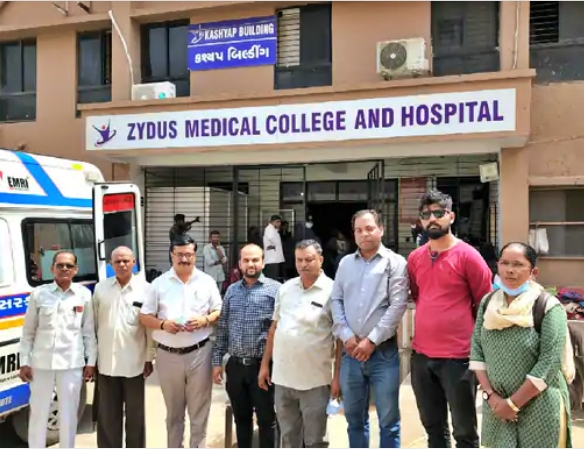 Rescue team standing in front of Zydus Hospital