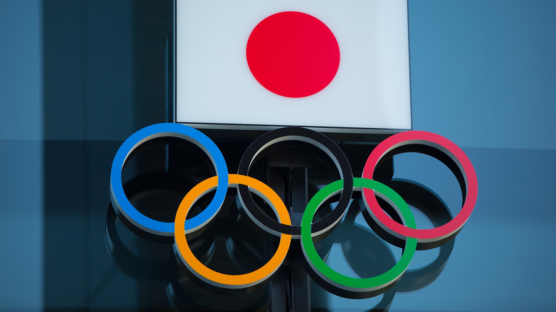 Japan committed to organizing Olympics next year says Suga