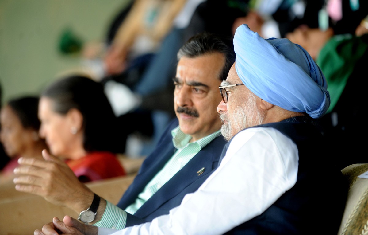 Former Pakistan Prime Minister Yousaf Raza Gillani and his Indian counterpart Manmohan Singh during the semi-final between India and Pakistan in Mohali, India, on March 30, 2011.