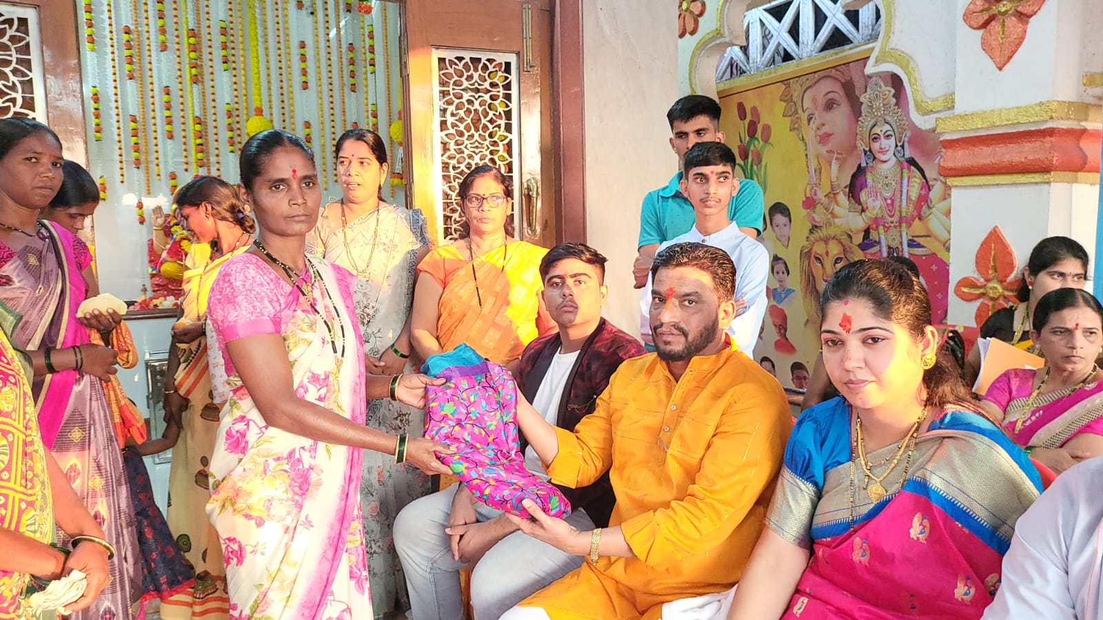 Distribution of sarees to women