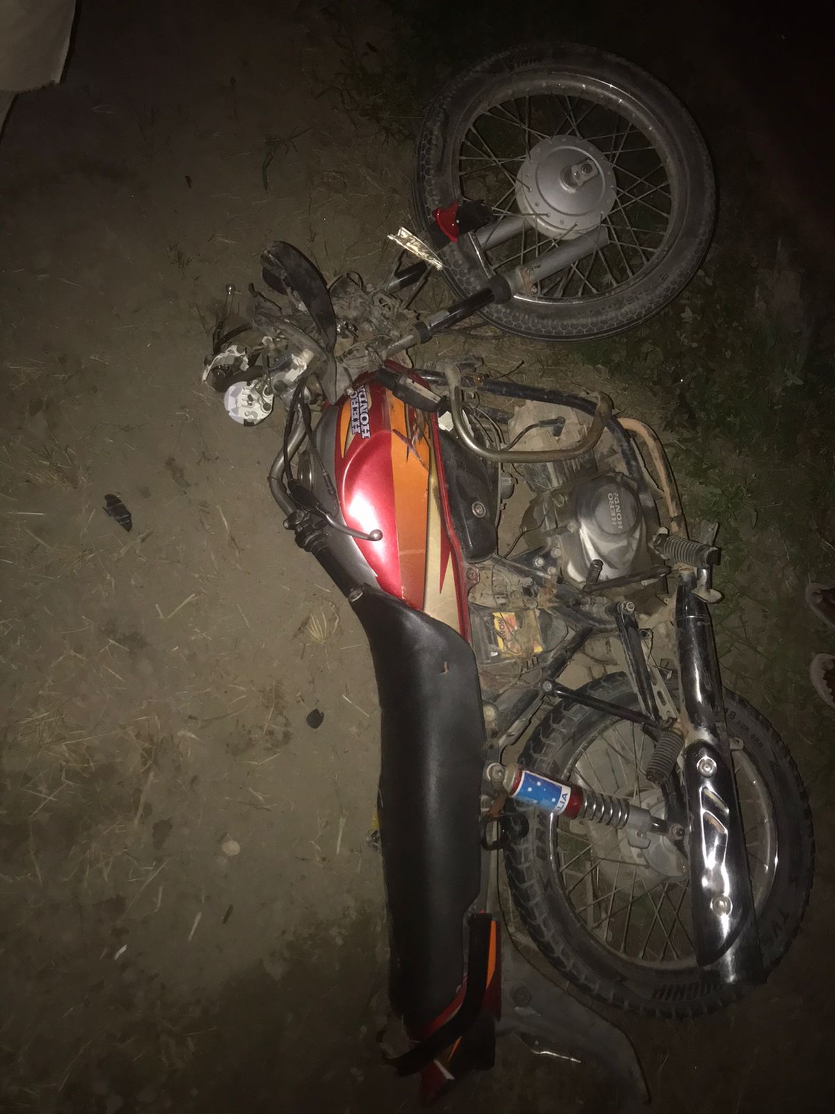 unidentified vehicle hit a motorcycle rider