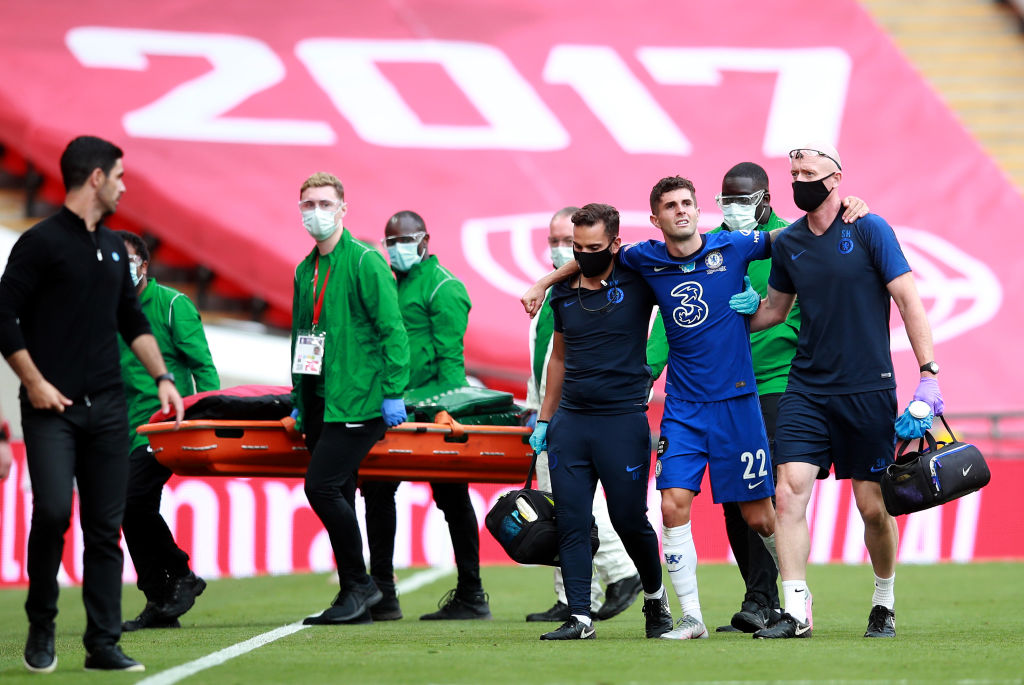 Injured Pulistic leaving the field as he struggles to walk.