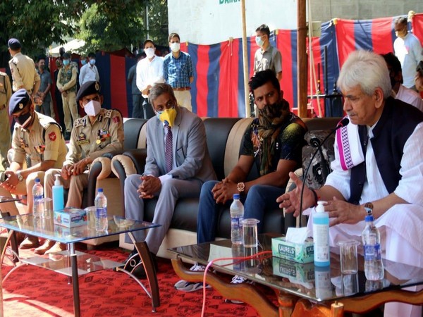 Suresh Raina with Lieutenant Governor of Jammu and Kashmir Manoj Sinha.