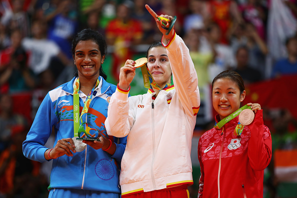 PV Sindhu (L), Carolina Manin (M) and Nozomi Okuhara (R) at the Olympic podium.