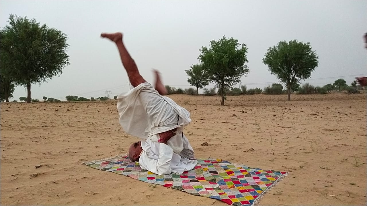 74-year-old Shivbhagvan Bhakar, from Pichkarai Tal village of Sardarshahar Tehsil in Churu of Rajasthan, can perform difficult yoga postures