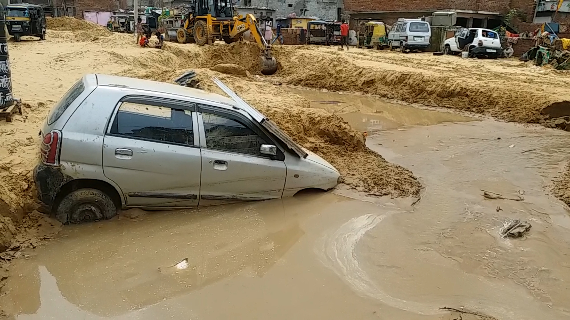 vehicles buried in sand, house Buried in sand, Destruction by rain in jaipur