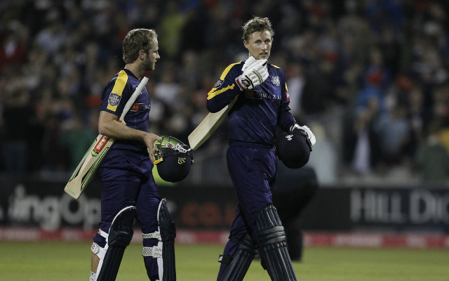 Joe Root with Kane Williamson.